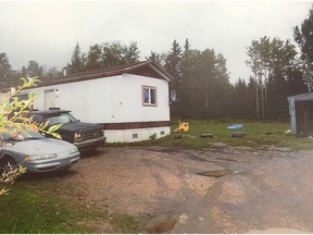 A mobile home on Jean Baptiste First Nations Reserve where a father and son were shot during a 2016 home invasion.