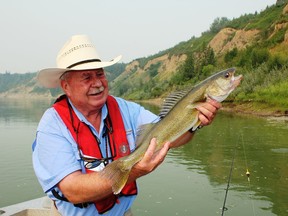 Neil with a North Saskatchewan River walleye. Neil Waugh/Edmonton Sun