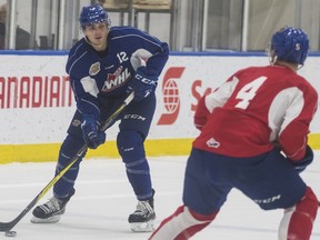 Quinn Benjafield looks for an open man during an Edmonton Oil Kings training camp game at Rogers Place in Edmonton on Monday August 27, 2018.