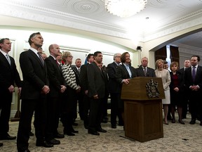 The new cabinet is seen after the swearing in of Premier Alison Redford's new cabinet at Government House in Edmonton, Alta., on Friday, Dec. 13, 2013. Ian Kucerak/File