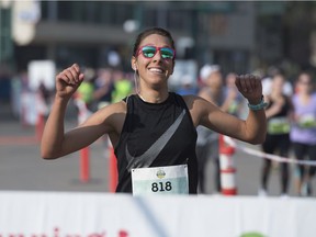 Leanne Klassen was the first woman to finish the Edmonton Marathon on Jasper Avenue in front of the Shaw Conference Centre on Sunday, Aug. 19, 2018.