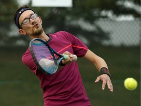 Chris Zimmel competes in the first round of the Alberta Open at the University of Alberta Outdoor Tennis Centre in Edmonton on August 23, 2018.