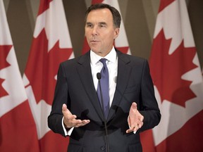 Federal Finance Minister Bill Morneau addresses journalists in Toronto on Thursday August 30, 2018, as he talks about the government's Trans Mountain pipeline plan.