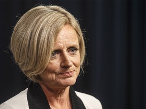 Alberta Premier Rachel Notley speaks at a news conference in Edmonton on Thursday August 30, 2018. Notley says she's pulling the province out of the federal climate change plan. THE CANADIAN PRESS/Jason Franson ORG XMIT: EDM103