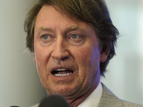 Hockey great Wayne Gretzky talks with the media at the Hlinka Gretzky Cup hockey tournament in Edmonton on August 8, 2018.
