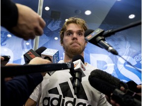 Connor McDavid speaks to the media during the opening day of the Edmonton Oiler's training camp at Rogers Place, Thursday Sept. 13, 2018. Photo by David Bloom
