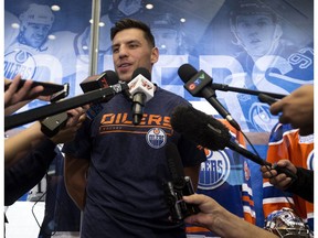 Milan Lucic speaks to the media during the opening day of the Edmonton Oiler's training camp at Rogers Place, Thursday Sept. 13, 2018.