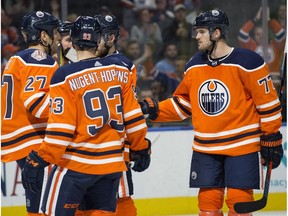 The Edmonton Oilers celebrate Milan Lucic's (27) goal against the Winnipeg Jets during third period pre-season NHL action at Rogers Place, in Edmonton Thursday Sept. 20, 2018. The Oilers won 7-3.