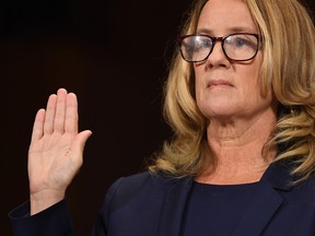 Christine Blasey Ford, the woman accusing Supreme Court nominee Brett Kavanaugh of sexually assaulting her at a party 36 years ago, testifies before the US Senate Judiciary Committee on Capitol Hill in Washington, DC, September 27, 2018. (Photo by SAUL LOEB / AFP)