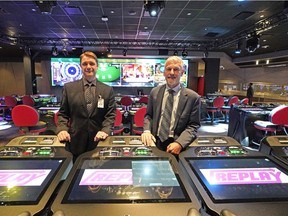 Stephen Rowbotham (left, Assistant General Manager) and Kevin Booth (right, General Manager) at the interactive play stations in the renovated Starlight Casino at West Edmonton Mall on September 21, 2018. The casino will have its grand opening on September 26, 2018.