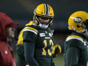 Edmonton Eskimos quarterback Mike Reilly (13) watches the end of the game from the sidelines against the Winnipeg Blue Bombers on Saturday, Sept. 29, 2018 in Edmonton.