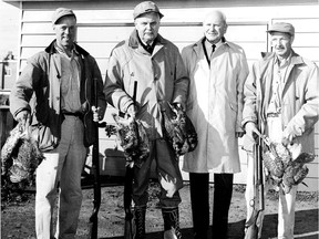 Former Conservative Prime Minister John Diefenbaker (second from the left) with a fine bag of ruffed grouse. Supplied