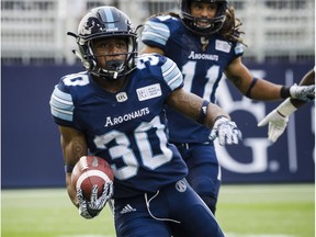 Toronto Argonauts running back Martese Jackson (30) runs the ball in fourth quarter CFL action against the B.C. Lions in Toronto on Saturday, August, 18, 2018.
