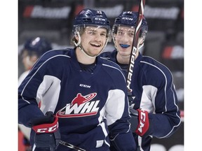Regina Pats forward Sam Steel, left, and teammate Cameron Hebig are seen during a team practice before Sunday's Memorial Cup final against the Acadie-Bathurst Titan, in Regina, Saturday, May, 26, 2018.
