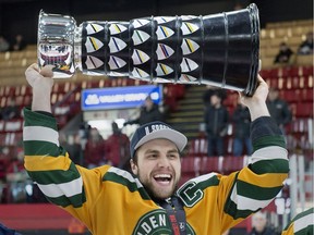 University of Alberta Golden Bears captain Riley Keiser celebrates after defeating the St. Francis Xavier University X-Men 4-2 to win the USports University Cup at the Canadian university men's hockey championship gold medal game in Fredericton on Sunday, March 18, 2018.