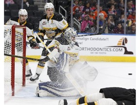 Brandon's goaltender Dylan Myskiw makes a save during the first period of a WHL game between the Edmonton Oil Kings and the Brandon Wheat Kings in Edmonton, Alberta on Wednesday, November 29, 2017.