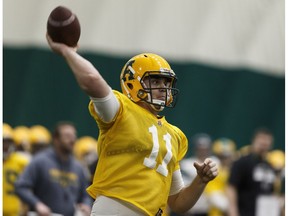 Quarterback Brad Baker (11) drills on the first day of the University of Alberta Golden Bears' football camp at the dome at Foote Field in Edmonton, on Thursday, April 26, 2018.