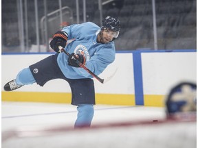 Darnell Nurse and a number of other Oilers  skating at Roger Place preparing for training camp  on September 5, 2018.