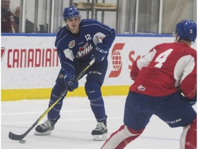 Quinn Benjafield looks for an open man during an Edmonton Oil Kings training camp game at Rogers Place in Edmonton on Monday August 27, 2018.