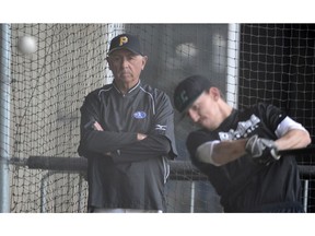 Ray Brown keeps an eye on batting practice for Prospects players at Telus Field in Edmonton.