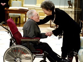 Feb. 20, 2004. Canada's Governor General Adrienne Clarkson congratulates Edmonton's social activist and wheelchair athlete sports administrator Gary McPherson, after investing him into the Order of Canada in Ottawa on Friday Feb. 20, 2004.  McPherson from Edmonton was paralyzed with quadripplegia from childhood polio works with the disabled and does not let the handicap stop him from enjoying life to the fullest. Ottawa Sun/QMI Agency