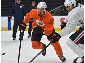After finalizing his contract, Edmonton Oilers defenceman Darnell Nurse (25) attends his first practice session here with Milan Lucic during training camp at Rogers Place in Edmonton, September 18, 2018.