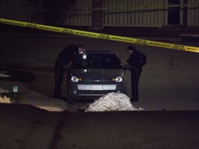 Calgary police are investigating after a shooting in the 100 block of Signal Hil Circle left one man dead and sent another to hospital on Friday, Oct. 12, 2018. (Zach Laing / Postmedia Network)