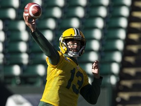 Mike Reilly takes part in an Edmonton Eskimos' team practice at Commonwealth Field, in Edmonton, Wednesday Oct. 3, 2018.
