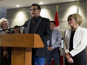 Lubicon Lake Band Chief Billy Joe Laboucan and Alberta Premier Rachel Notley take part in a news conference on Wednesday, Oct. 24 2018 after reaching a historic land claim settlement.