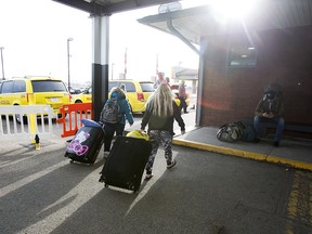 Passengers arrive from Calgary at the Edmonton Greyhound station, Wednesday Oct. 31, 2018. Greyhound Canada is ending all routes in Alberta on Oct. 31, 2018. Photo by David Bloom
