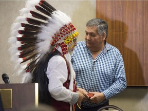 Mikisew Cree First Nation Chief Archie Waquan and former chief Steve Courtoureille at a media event about the Supreme Court ruling that federal and provincial governments do not have the duty to consult about legislation threatening First Nations rights on Thursday, Oct. 11, 2018.