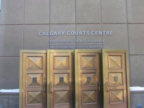 The sign at the Calgary Courts Centre in Calgary is shown on Friday, Jan. 5, 2018.