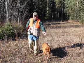 Neil and Penny on the ruffed grouse trails in the oil patch near Lodgepole. Neil Waugh/Edmonton Sun