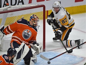 Pittsburgh Penguins Sidney Crosby can't get the rebound in front of Edmonton Oilers goalie Cam Talbot during NHL action at Rogers Place on Tuesday, Oct. 23, 2018.