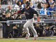 Steve Pearce of the Boston Red Sox celebrates his eighth-inning home run against the Los Angeles Dodgers in Game Five of the 2018 World Series at Dodger Stadium on Oct. 28, 2018 in Los Angeles.