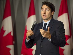 Prime Minister Justin Trudeau speaks to supporters at an open Liberal fundraising event in Montreal on Tuesday, Oct. 23, 2018. (THE CANADIAN PRESS/Peter McCabe)