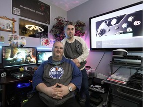 Lead designer James Yake, front, and lead engineer Nikoly Eltsov at SnakeTakes Studios, an Edmonton-based video game developer who is preparing to launch a new game, End of the Beginning, in partnership with Sony, Microsoft and Steam.