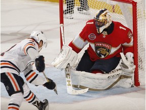 Goaltender Roberto Luongo of the Florida Panthers stops a shot by Drake Caggiula of the Edmonton Oilers at the BB&T Center on November 8, 2018 in Sunrise, Florida.