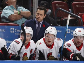 Head coach Guy Boucher of the Ottawa Senators looks on during a Florida Panthers power play at  on November 11, 2018 in Sunrise, Florida.