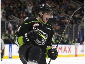 The Edmonton Oil Kings' Quinn Benjafield (14) celebrates his second period goal against the Lethbridge Hurricanes, in Edmonton Sunday Oct. 28, 2018. Photo by David Bloom