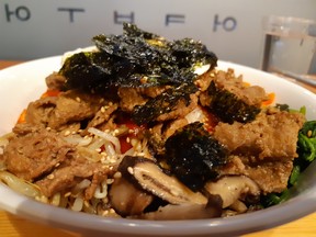 The BUOK Bibimbap bowl: rice, veggies, bulgogi beef, chili sauce all topped with an egg. PHOTOS BY GRAHAM HICKS/EDMONTON SUN