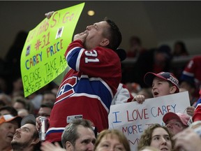 Montreal Canadiens' fans celebrate the Canadiens' first period goal against the Edmonton Oilers, at Rogers Place on Tuesday, Nov. 13, 2018.