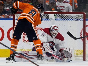 The Edmonton Oilers' Ty Rattie (8) is stopped by the Montreal Canadiens' Antti Niemi (37) during second period NHL action at Rogers Place, in Edmonton Tuesday Nov. 13, 2018. Photo by David Bloom