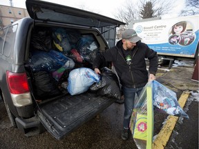 Josh Hudon drops off 49 bags of clothing to the Bissell Centre Thrift Shop, 8818 118 Avenue, in Edmonton Monday November 19, 2018.
