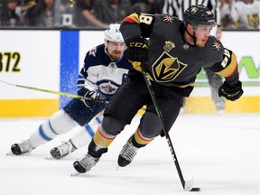 Nate Schmidt of the Vegas Golden Knights carries the puck against the Winnipeg Jets during the first period in Game Four of the Western Conference Finals during the 2018 NHL Stanley Cup Playoffs at T-Mobile Arena on May 18, 2018 in Las Vegas, Nevada.