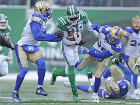 Saskatchewan Roughriders defensive back Loucheiz Purifoy returns a kickoff against the Winnipeg Blue Bombers during first half CFL West Division semi-final action in Regina on Sunday, Nov. 11, 2018.