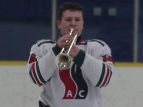 SSAC Don Wheaton Midget AA player Julian Perilli played Last Post before the team's game Nov. 11. For Cam Tait Edmonton Sun column Nov. 18, 2018. Stephanie Perilli/Supplied