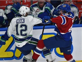 Edmonton Oil Kings Will Warm (4) and Swift Current Broncos Eric Houk (12) crash into each other during WHL action at Rogers Place in Edmonton, September 28, 2018. Ed Kaiser/Postmedia