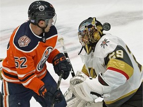 Edmonton Oilers winger Patrick Russell looks for a rebound as the puck flies past Vegas Golden Knights goalie Marc-Andre Fleury during NHL game action in Edmonton on Sunday, Nov. 18, 2018.