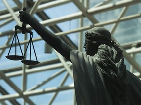 The Scales of Justice statue at B.C. Supreme Court in Vancouver. Feng Eng, who has permanent resident status, pleaded guilty in June 2016 to one assault causing bodily harm and assault with a weapon.